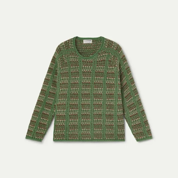 Jersey Compañía Fantástica verde con bordados en marrón y blanco.