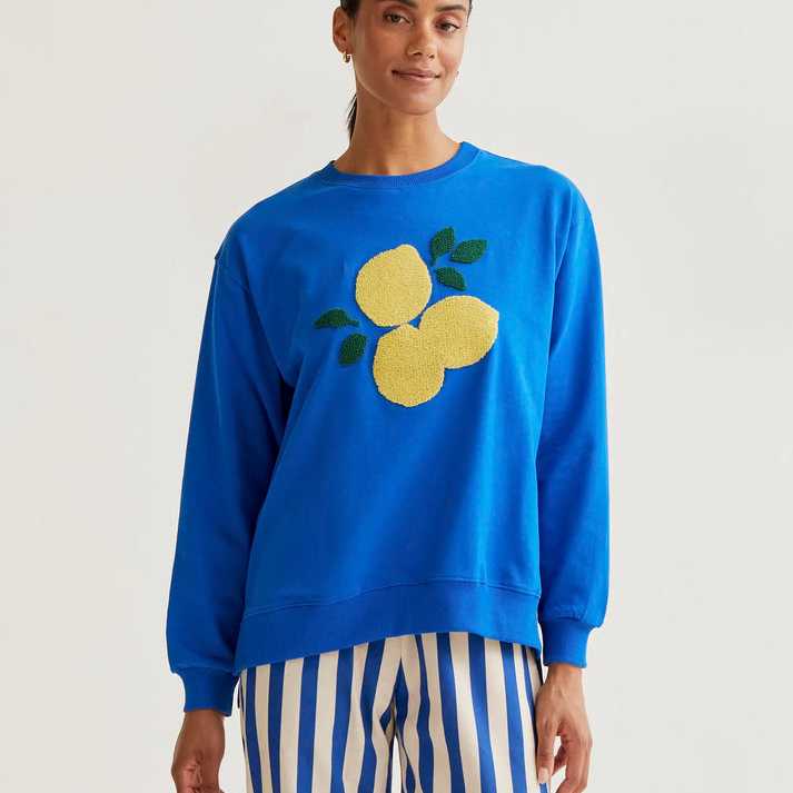 Sudadera Compañía Fantástica Limones gigante azul